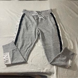 Pink Victoria Secret grey joggers with bling letters on side.